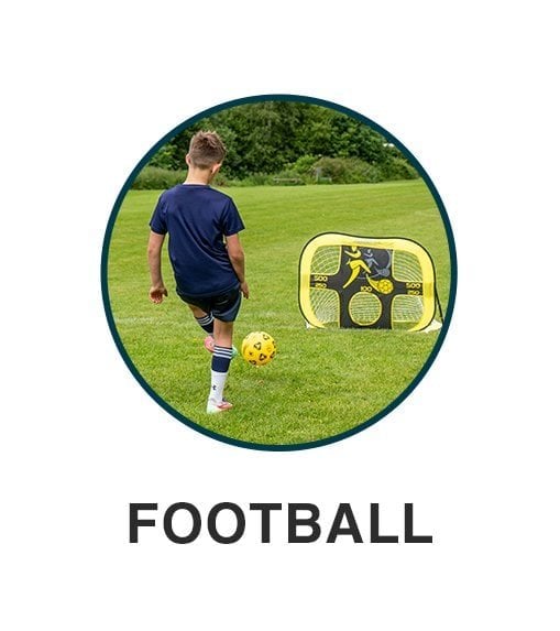 Young teen playing with a football