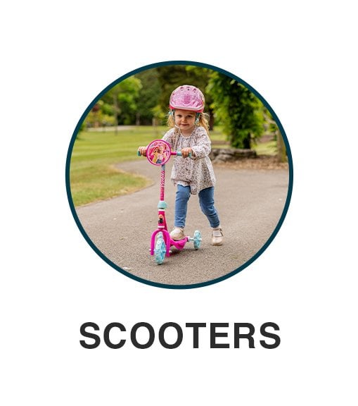 Little girl on a kids scooter